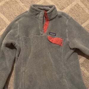 Patagonia women's fleece in Gray and pink